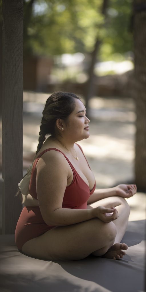 woman meditating at the spa